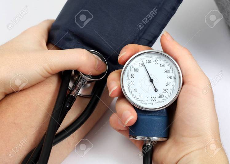 41664023-doctor-measuring-blood-pressure-of-a-patient